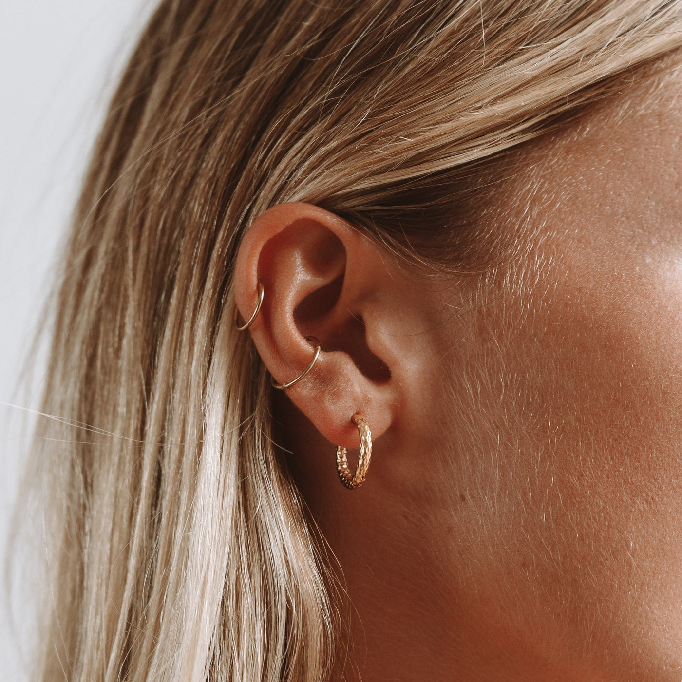WILLA. Hammered Huggie Earrings