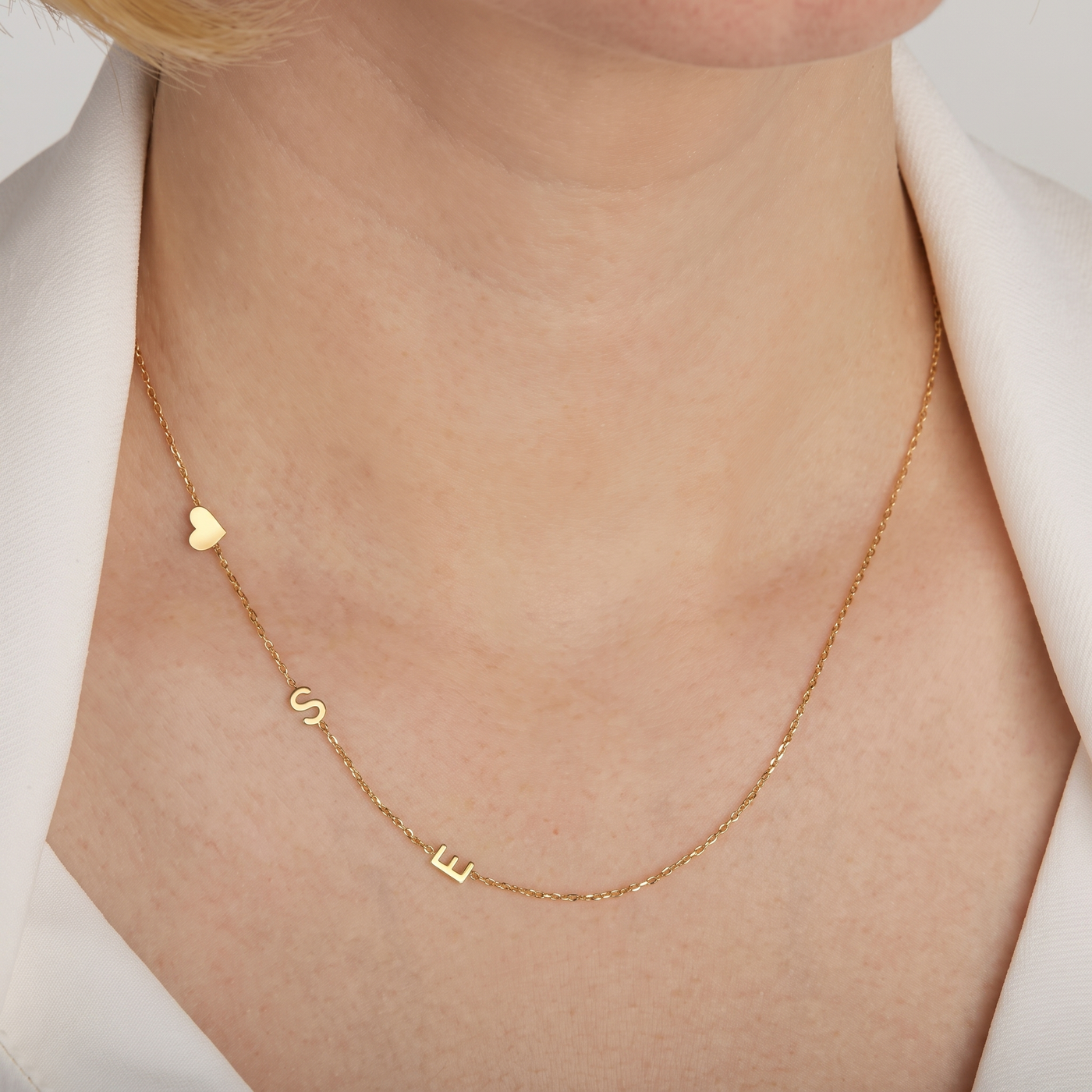 SAOIRSE. Side Initial Necklace