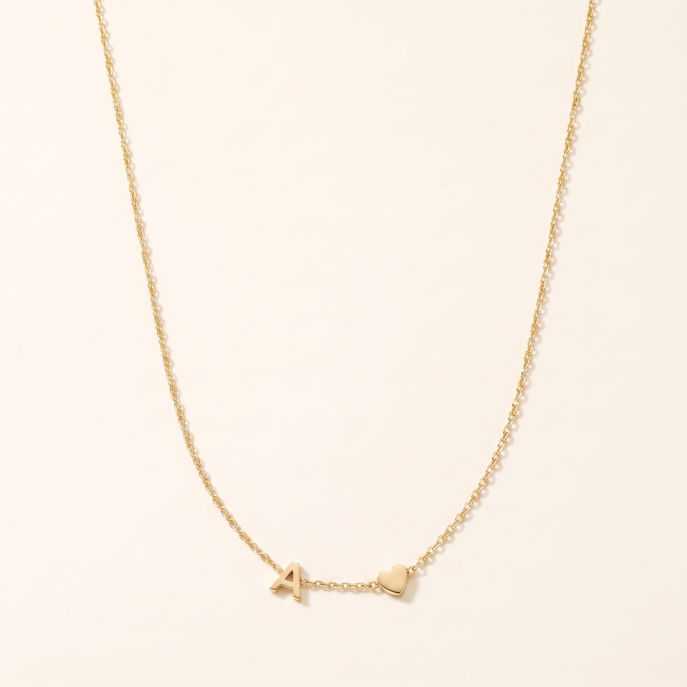 SAOIRSE. Side Initial Necklace