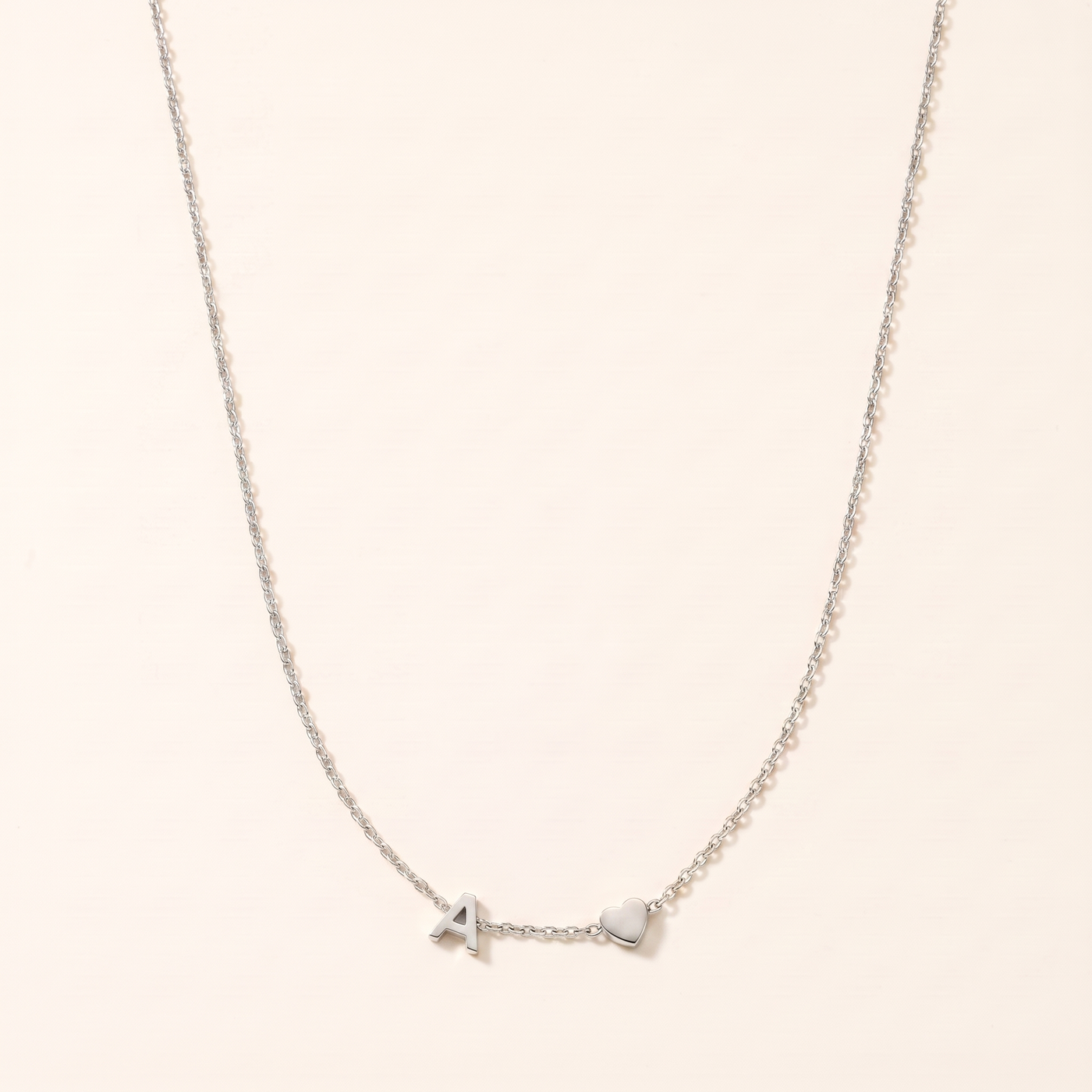 SAOIRSE. Side Initial Necklace