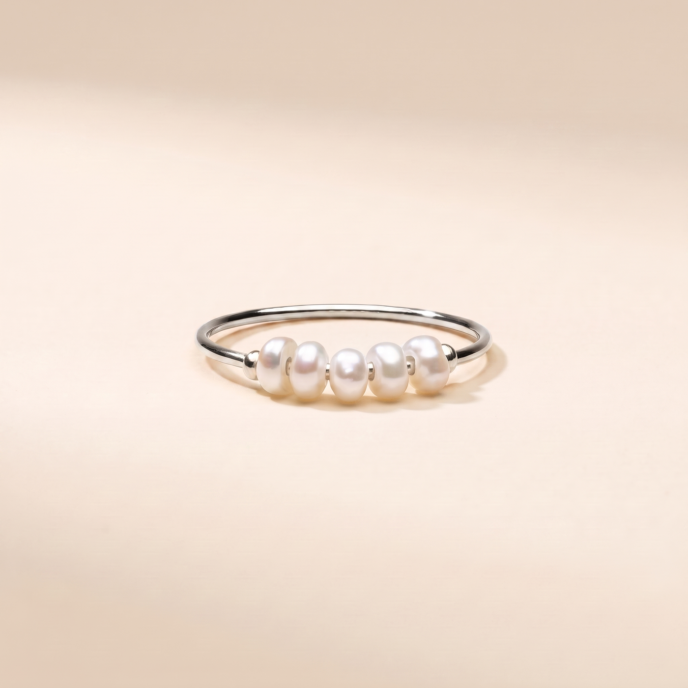 WINNIE. Mini Pearl Ring