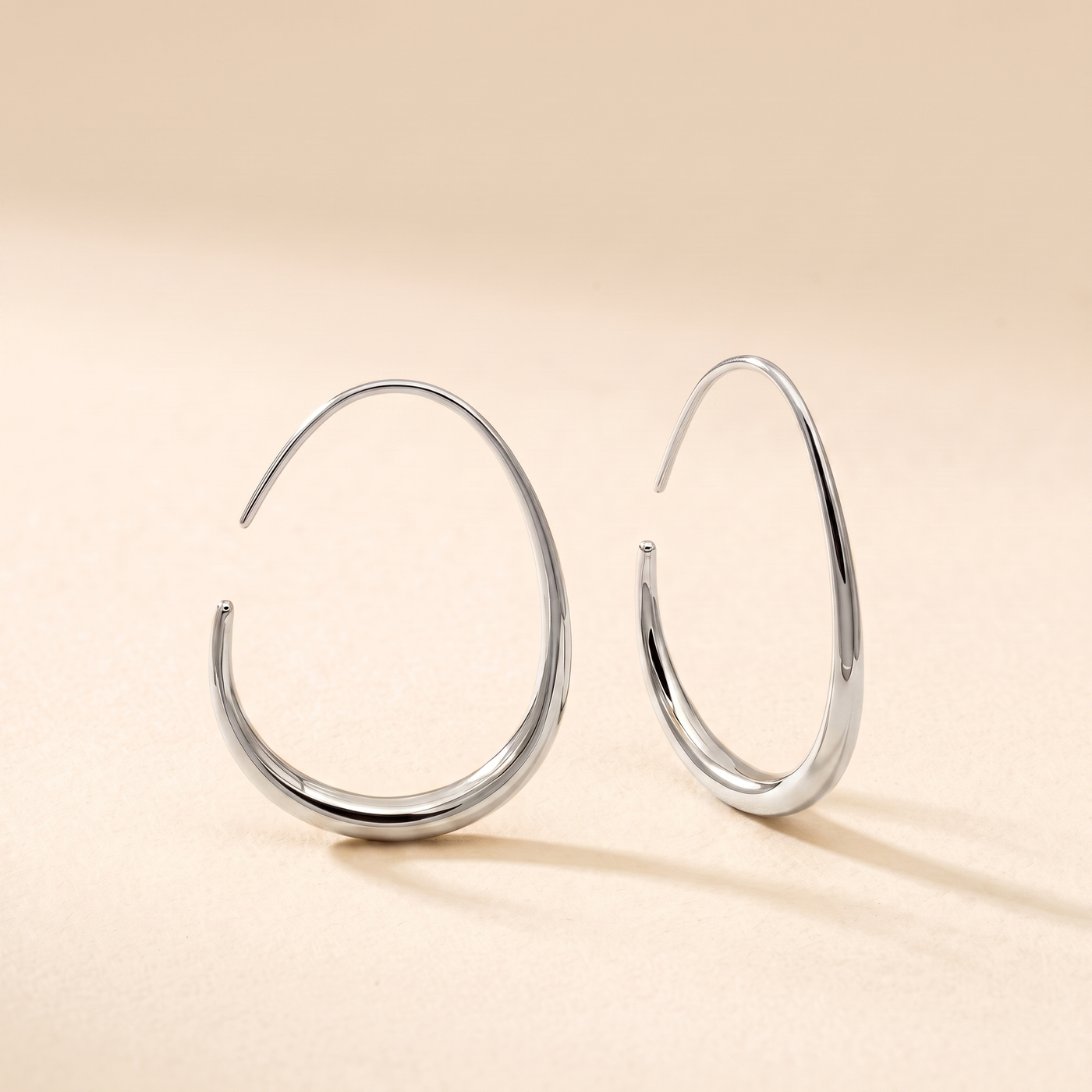 NADIA. Teardrop Hoop Earrings